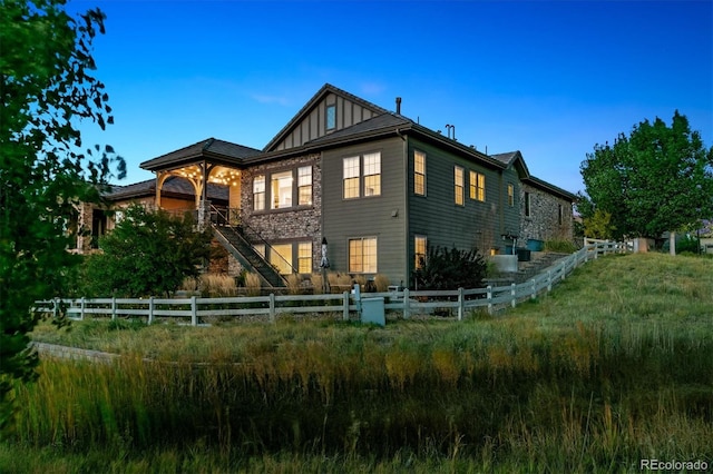 10731 Featherwalk Ln, Highlands Ranch, CO 80126 - back of house with board and batten siding