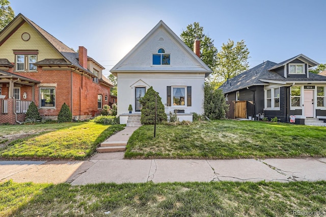 1006 S Emerson St, Denver, CO 80209 - victorian home with a front yard and stucco siding