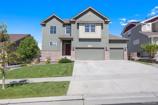 12210 Pine Post Dr, Parker, CO 80138 - view of front of property featuring brick siding, concrete driveway, an attached garage, and a front yard
