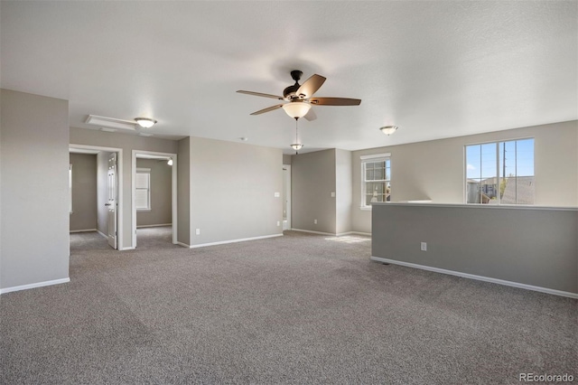 12210 Pine Post Dr, Parker, CO 80138 - empty room featuring a ceiling fan, carpet floors, and baseboards