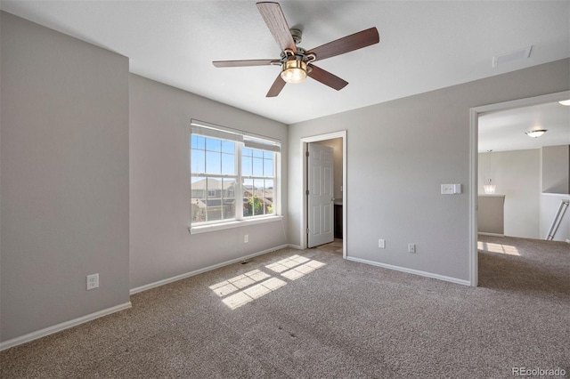 12210 Pine Post Dr, Parker, CO 80138 - unfurnished bedroom featuring carpet flooring, baseboards, and a ceiling fan