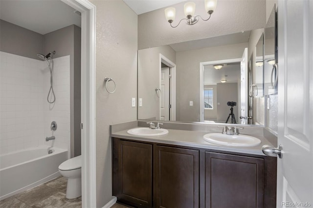 12210 Pine Post Dr, Parker, CO 80138 - full bath featuring toilet, double vanity, shower / bath combination, and a textured wall