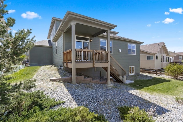12210 Pine Post Dr, Parker, CO 80138 - back of property featuring stairway and a wooden deck