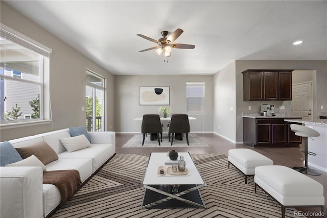 12210 Pine Post Dr, Parker, CO 80138 - living room with a ceiling fan, dark wood-style flooring, baseboards, and recessed lighting