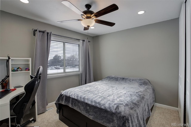 bedroom with recessed lighting, baseboards, ceiling fan, and light colored carpet