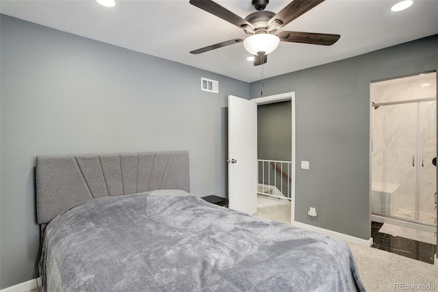 carpeted bedroom with a ceiling fan, visible vents, and baseboards