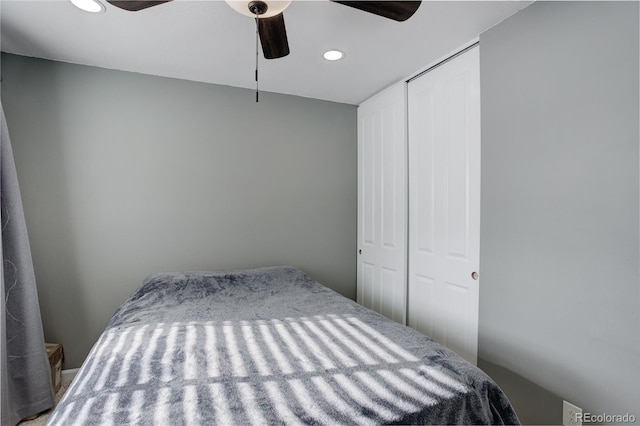 bedroom featuring a closet, a ceiling fan, and recessed lighting