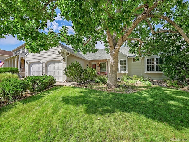 5319 E Davies Dr, Centennial, CO 80122 - view of front facade with a front lawn, a garage, and a shingled roof