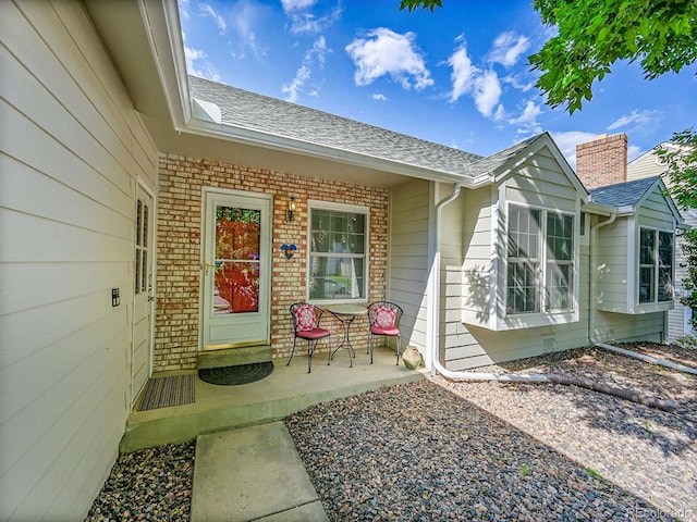 5319 E Davies Dr, Centennial, CO 80122 - entrance to property with brick siding and a shingled roof