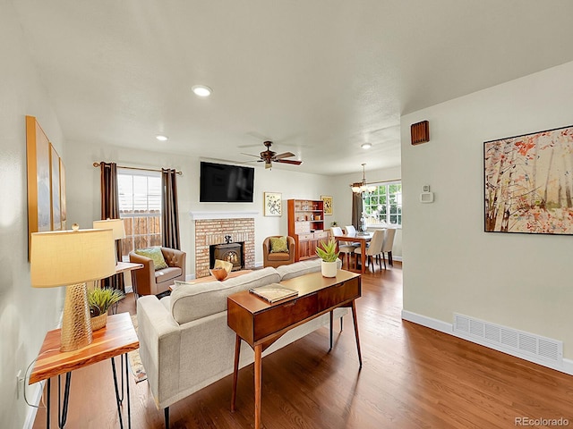 5319 E Davies Dr, Centennial, CO 80122 - living area with ceiling fan, wood finished floors, recessed lighting, and a fireplace