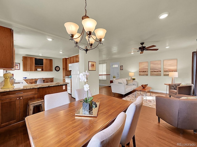 5319 E Davies Dr, Centennial, CO 80122 - dining room featuring dark wood-type flooring, recessed lighting, a chandelier, and ceiling fan