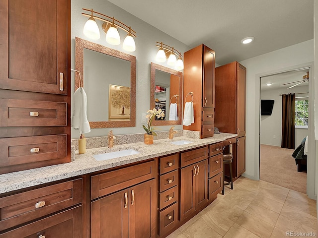 5319 E Davies Dr, Centennial, CO 80122 - full bath featuring double vanity, recessed lighting, and tile patterned floors