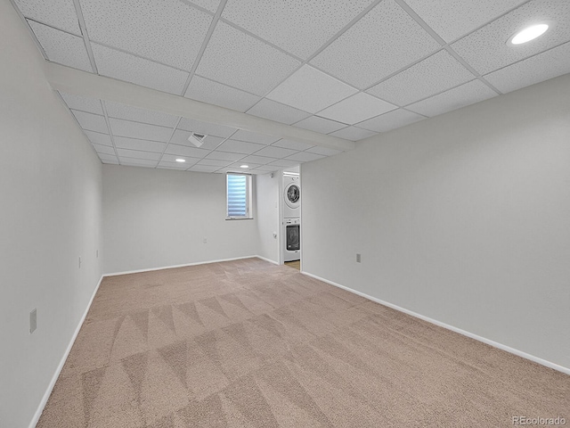 5319 E Davies Dr, Centennial, CO 80122 - below grade area featuring estacked washer and dryer, carpet flooring, a drop ceiling, and recessed lighting