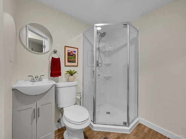 5319 E Davies Dr, Centennial, CO 80122 - full bath with wood finished floors, a stall shower, and vanity
