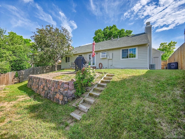 5319 E Davies Dr, Centennial, CO 80122 - rear view of property with a chimney