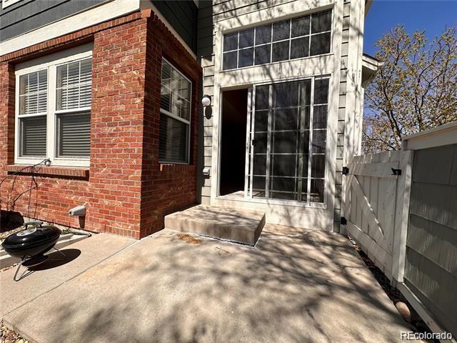 property entrance with a patio area