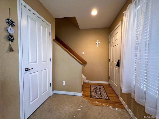 entrance foyer featuring hardwood / wood-style flooring