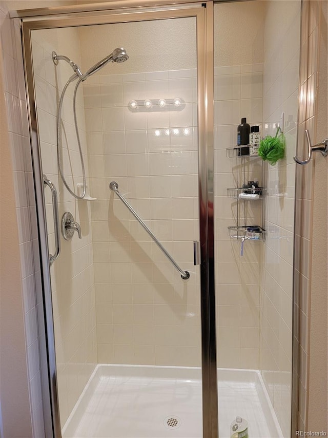 bathroom with a stall shower