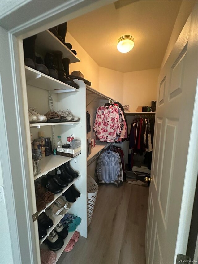 12235 E 2nd Dr, Aurora, CO 80011 - spacious closet with wood finished floors