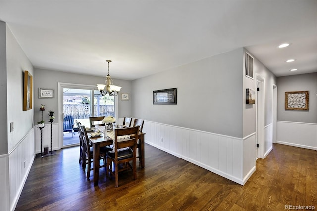 1733 S Urban Way, Lakewood, CO 80228 - dining space with dark wood-style flooring, a chandelier, wainscoting, recessed lighting, and baseboards