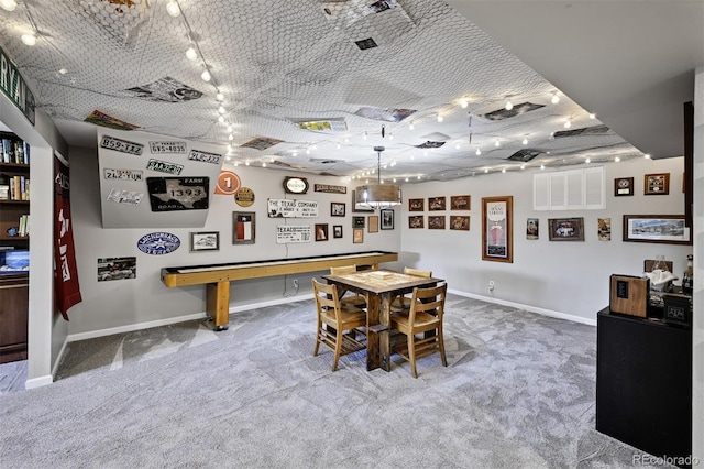 1733 S Urban Way, Lakewood, CO 80228 - dining space with carpet floors, baseboards, and rail lighting