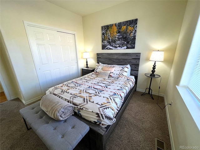 carpeted bedroom featuring a closet