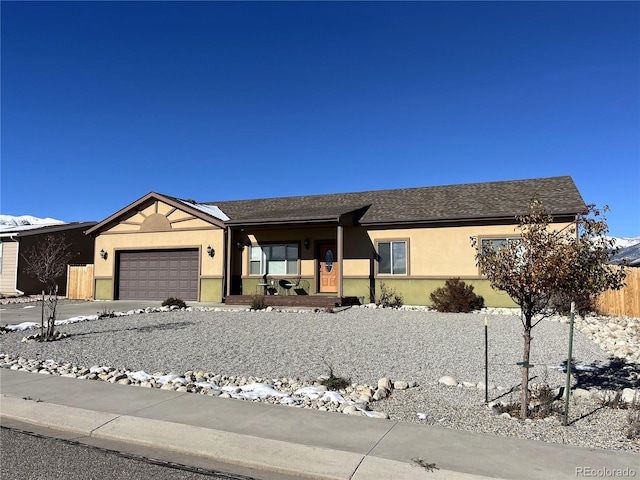 ranch-style house featuring a garage