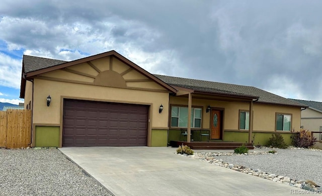 ranch-style house featuring a garage