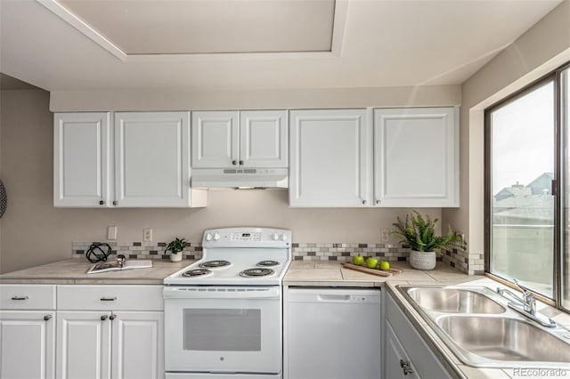 3049 E Long Cir S, Centennial, CO 80122 - kitchen featuring white appliances, under cabinet range hood, and white cabinets