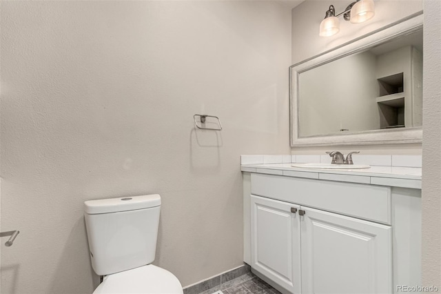 3049 E Long Cir S, Centennial, CO 80122 - half bathroom featuring vanity and toilet