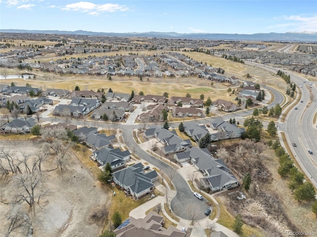 birds eye view of property with a mountain view and a residential view