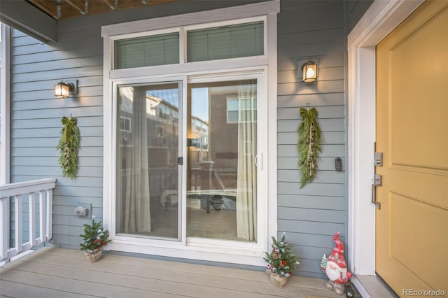 doorway to property featuring a porch