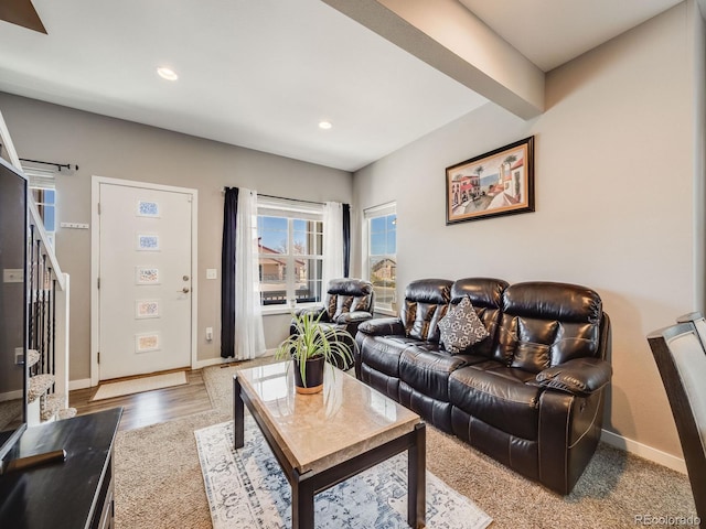 246 Ash St, Bennett, CO 80102 - living room featuring recessed lighting, baseboards, stairs, wood finished floors, and beamed ceiling