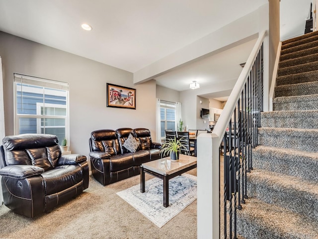 246 Ash St, Bennett, CO 80102 - living area with carpet flooring, recessed lighting, and stairs