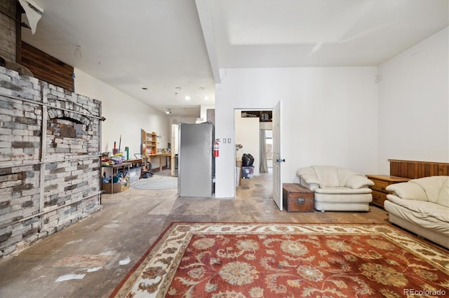 living room with beamed ceiling