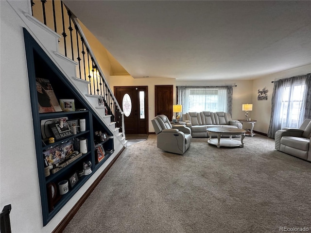 495 E Ave, Limon, CO 80828 - living area featuring carpet, plenty of natural light, baseboards, and stairs