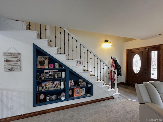 495 E Ave, Limon, CO 80828 - carpeted entrance foyer with stairway and baseboards