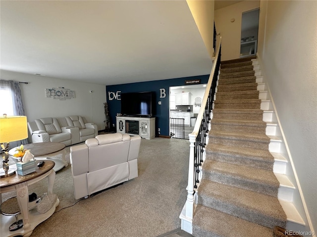 495 E Ave, Limon, CO 80828 - living area with stairs and carpet floors