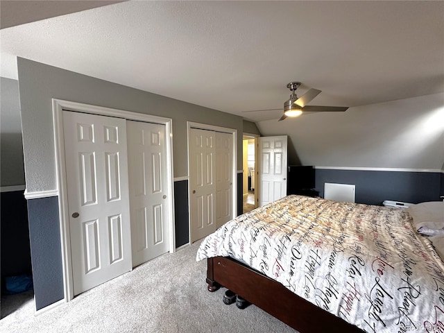 495 E Ave, Limon, CO 80828 - bedroom featuring multiple closets, carpet flooring, vaulted ceiling, and ceiling fan