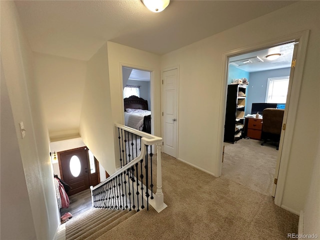 495 E Ave, Limon, CO 80828 - hallway with carpet flooring, an office area, baseboards, and an upstairs landing