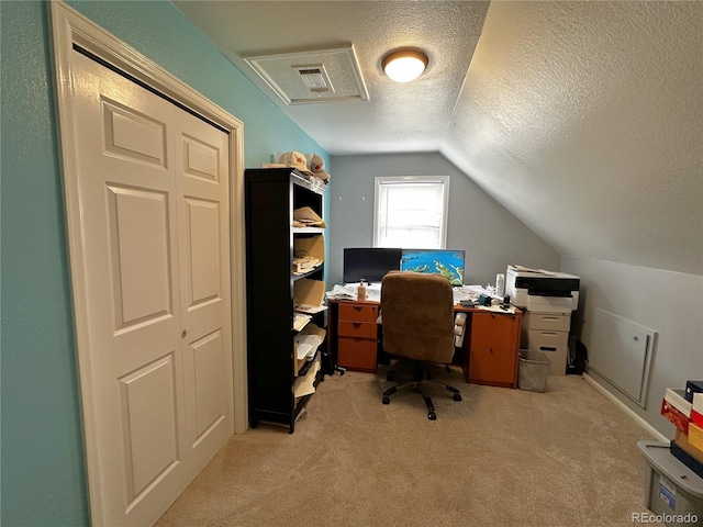 495 E Ave, Limon, CO 80828 - office featuring lofted ceiling, carpet floors, and a textured ceiling