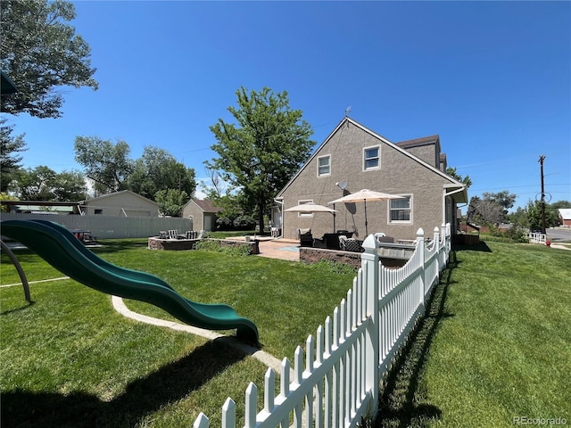 495 E Ave, Limon, CO 80828 - back of house featuring a playground