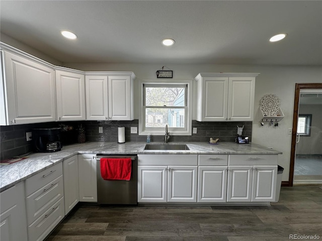 495 E Ave, Limon, CO 80828 - kitchen featuring stainless steel dishwasher, plenty of natural light, white cabinets, backsplash, and recessed lighting