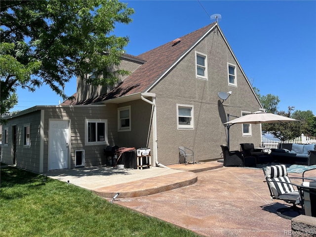495 E Ave, Limon, CO 80828 - back of house featuring an outdoor living space, a patio, and stucco siding
