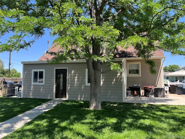 495 E Ave, Limon, CO 80828 - back of house with a patio area and a shingled roof
