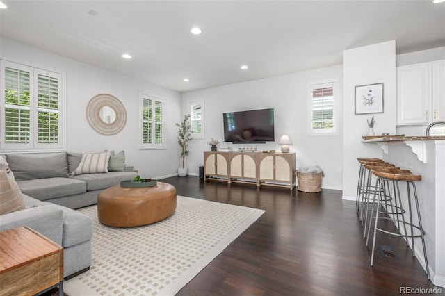 3433 N Wabash St, Denver, CO 80238 - living area with dark wood-type flooring and recessed lighting