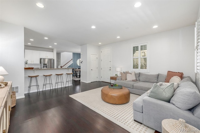 3433 N Wabash St, Denver, CO 80238 - living room with recessed lighting, dark wood-style flooring, and stairway