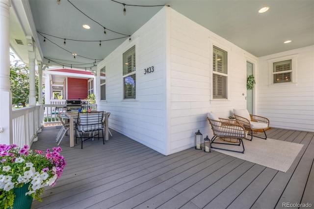 3433 N Wabash St, Denver, CO 80238 - porch featuring outdoor dining space