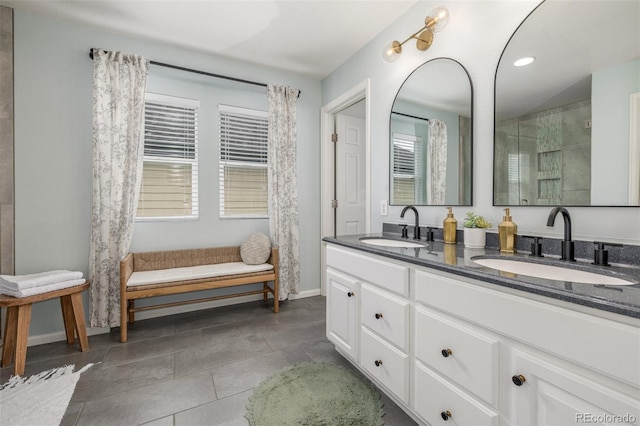 3433 N Wabash St, Denver, CO 80238 - full bath featuring double vanity, tile patterned floors, a shower, and recessed lighting