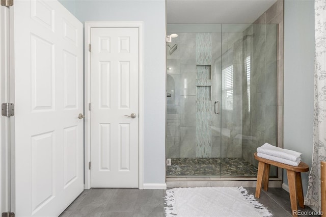3433 N Wabash St, Denver, CO 80238 - bathroom with a shower stall and tile patterned flooring